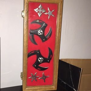 Throwing stars with display case.